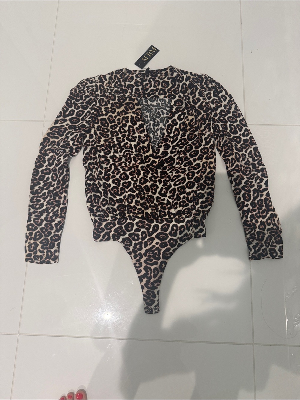 AFRM Leopard-Pattern Wrap Front Long Sleeve Bodysuit in Brown and Black